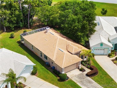 Welcome to your dream home nestled within the serene confines of on Heather Golf and Country Club in Florida - for sale on GolfHomes.com, golf home, golf lot
