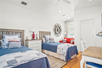 This stunning three-story waterfront residence offers 4 spacious on Palmilla Beach Golf Club in Texas - for sale on GolfHomes.com, golf home, golf lot