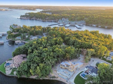 Experience the epitome of luxury living with these two adjoining on The Club At Porto Cima in Missouri - for sale on GolfHomes.com, golf home, golf lot