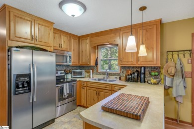 This charming mountain getaway offers a great location for all on The Rock At Jocassee in South Carolina - for sale on GolfHomes.com, golf home, golf lot