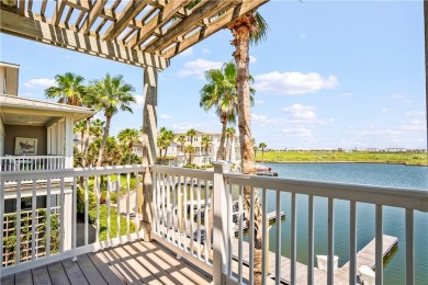 This stunning three-story waterfront residence offers 4 spacious on Palmilla Beach Golf Club in Texas - for sale on GolfHomes.com, golf home, golf lot