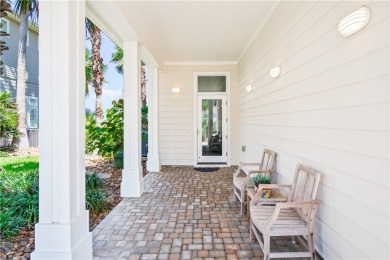 This stunning three-story waterfront residence offers 4 spacious on Palmilla Beach Golf Club in Texas - for sale on GolfHomes.com, golf home, golf lot