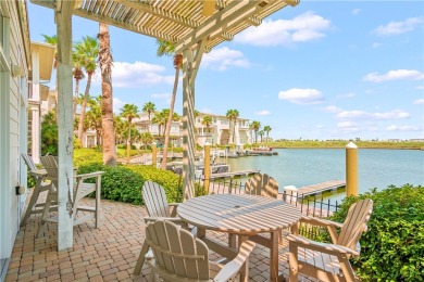 This stunning three-story waterfront residence offers 4 spacious on Palmilla Beach Golf Club in Texas - for sale on GolfHomes.com, golf home, golf lot