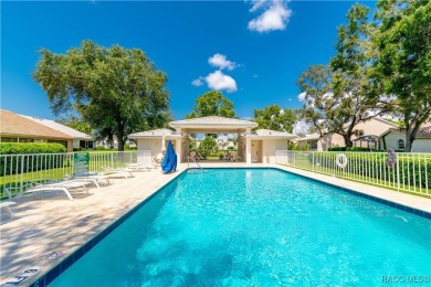 Welcome to your dream home nestled within the serene confines of on Heather Golf and Country Club in Florida - for sale on GolfHomes.com, golf home, golf lot
