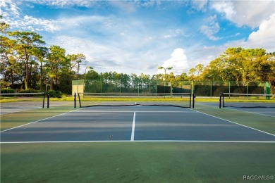Welcome to your dream home nestled within the serene confines of on Heather Golf and Country Club in Florida - for sale on GolfHomes.com, golf home, golf lot