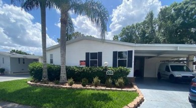 Discover this stunning triple-wide manufactured home in on Schalamar Creek Golf and Country Club in Florida - for sale on GolfHomes.com, golf home, golf lot