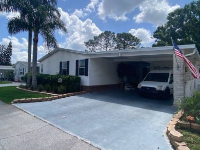 Discover this stunning triple-wide manufactured home in on Schalamar Creek Golf and Country Club in Florida - for sale on GolfHomes.com, golf home, golf lot