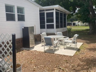 Discover this stunning triple-wide manufactured home in on Schalamar Creek Golf and Country Club in Florida - for sale on GolfHomes.com, golf home, golf lot