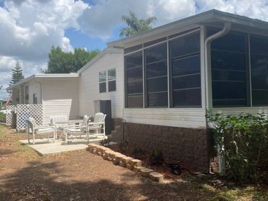 Discover this stunning triple-wide manufactured home in on Schalamar Creek Golf and Country Club in Florida - for sale on GolfHomes.com, golf home, golf lot