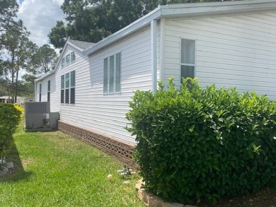 Discover this stunning triple-wide manufactured home in on Schalamar Creek Golf and Country Club in Florida - for sale on GolfHomes.com, golf home, golf lot