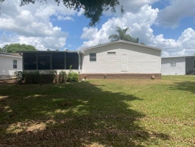 Discover this stunning triple-wide manufactured home in on Schalamar Creek Golf and Country Club in Florida - for sale on GolfHomes.com, golf home, golf lot