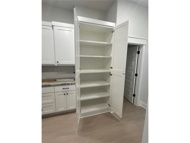 This open floorplan 2 bedroom, 2 bath house is beautiful! on Bella Vista - Metfield Golf Complex and Country Club in Arkansas - for sale on GolfHomes.com, golf home, golf lot