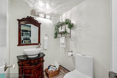 Discover unparalleled luxury in this exquisite 4-bedroom, 2 on The Diplomat Golf Resort and Spa in Florida - for sale on GolfHomes.com, golf home, golf lot