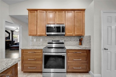 Welcome to your new home! This cozy 4-bedroom, 2-bathroom house on River Hall Country Club in Florida - for sale on GolfHomes.com, golf home, golf lot