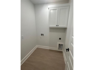 This open floorplan 2 bedroom, 2 bath house is beautiful! on Bella Vista - Metfield Golf Complex and Country Club in Arkansas - for sale on GolfHomes.com, golf home, golf lot