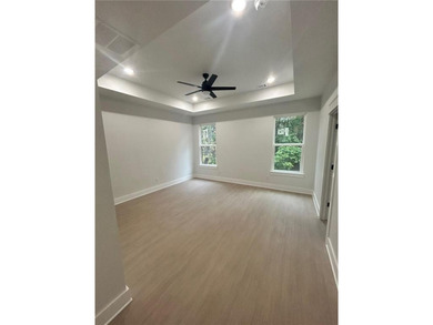 This open floorplan 2 bedroom, 2 bath house is beautiful! on Bella Vista - Metfield Golf Complex and Country Club in Arkansas - for sale on GolfHomes.com, golf home, golf lot