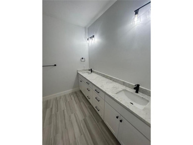 This open floorplan 2 bedroom, 2 bath house is beautiful! on Bella Vista - Metfield Golf Complex and Country Club in Arkansas - for sale on GolfHomes.com, golf home, golf lot