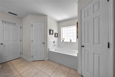 Welcome to your new home! This cozy 4-bedroom, 2-bathroom house on River Hall Country Club in Florida - for sale on GolfHomes.com, golf home, golf lot