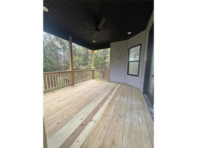 This open floorplan 2 bedroom, 2 bath house is beautiful! on Bella Vista - Metfield Golf Complex and Country Club in Arkansas - for sale on GolfHomes.com, golf home, golf lot