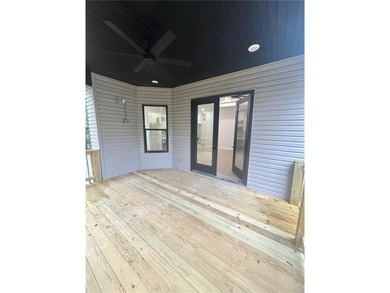 This open floorplan 2 bedroom, 2 bath house is beautiful! on Bella Vista - Metfield Golf Complex and Country Club in Arkansas - for sale on GolfHomes.com, golf home, golf lot