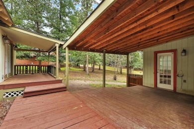 Charming Woodland Retreat in Holly Lake Ranch Resort! Nestled on on Holly Lake Ranch Golf Club in Texas - for sale on GolfHomes.com, golf home, golf lot