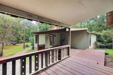 Charming Woodland Retreat in Holly Lake Ranch Resort! Nestled on on Holly Lake Ranch Golf Club in Texas - for sale on GolfHomes.com, golf home, golf lot