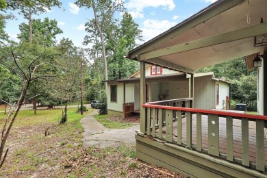 Charming Woodland Retreat in Holly Lake Ranch Resort! Nestled on on Holly Lake Ranch Golf Club in Texas - for sale on GolfHomes.com, golf home, golf lot