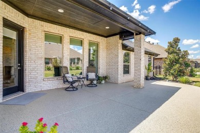 From the moment you approach the driveway, this home in the on Harbor Lakes Golf Club in Texas - for sale on GolfHomes.com, golf home, golf lot