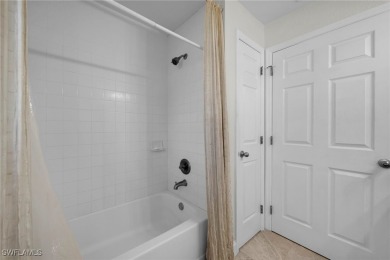 Welcome to your new home! This cozy 4-bedroom, 2-bathroom house on River Hall Country Club in Florida - for sale on GolfHomes.com, golf home, golf lot