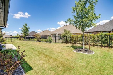 From the moment you approach the driveway, this home in the on Harbor Lakes Golf Club in Texas - for sale on GolfHomes.com, golf home, golf lot