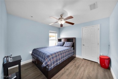 Welcome to your new home! This cozy 4-bedroom, 2-bathroom house on River Hall Country Club in Florida - for sale on GolfHomes.com, golf home, golf lot