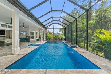 ***THIS HOME IS SHOWCASED WITH BOTH HIGH-QUALITY PHOTOS AND A on Plantation Bay Golf and Country Club in Florida - for sale on GolfHomes.com, golf home, golf lot
