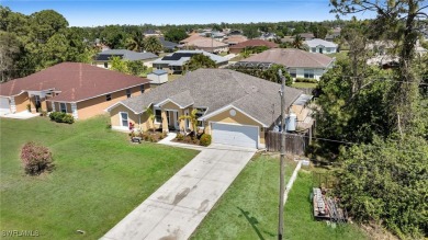 Welcome to your new home! This cozy 4-bedroom, 2-bathroom house on River Hall Country Club in Florida - for sale on GolfHomes.com, golf home, golf lot