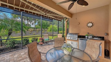 Beautifully positioned in the amenity-rich Esplanade Golf & on Esplanade Golf and Country at Lakewood Ranch in Florida - for sale on GolfHomes.com, golf home, golf lot