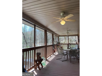 THIS CHARMING 3BR/3.5 BT HOME BOAST A PICURESQUE SETTING WITHIN on Innsbruck Resort and Golf Club in Georgia - for sale on GolfHomes.com, golf home, golf lot