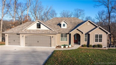 This exceptional residence has a wall of windows providing a on Osage National Golf Club in Missouri - for sale on GolfHomes.com, golf home, golf lot