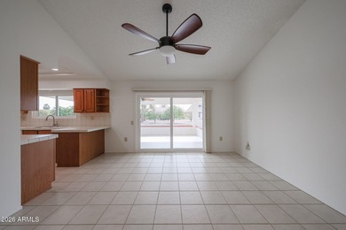 This well-maintained Capistrano offers vaulted ceilings that on Echo Mesa Golf Course in Arizona - for sale on GolfHomes.com, golf home, golf lot