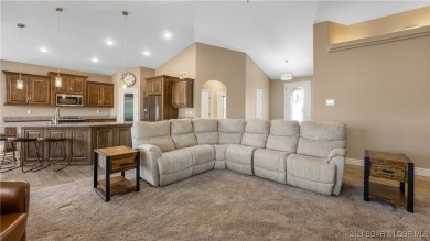 This exceptional residence has a wall of windows providing a on Osage National Golf Club in Missouri - for sale on GolfHomes.com, golf home, golf lot