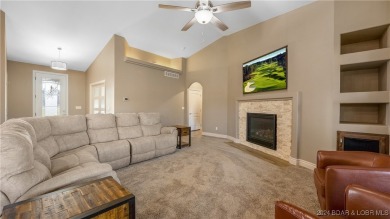 This exceptional residence has a wall of windows providing a on Osage National Golf Club in Missouri - for sale on GolfHomes.com, golf home, golf lot