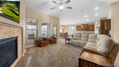 This exceptional residence has a wall of windows providing a on Osage National Golf Club in Missouri - for sale on GolfHomes.com, golf home, golf lot