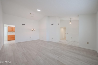 This well-maintained Capistrano offers vaulted ceilings that on Echo Mesa Golf Course in Arizona - for sale on GolfHomes.com, golf home, golf lot