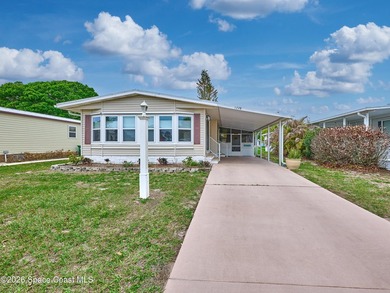 Beautifully updated home offering spacious, relaxed living with on Barefoot Bay Golf Course in Florida - for sale on GolfHomes.com, golf home, golf lot