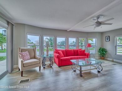 Beautifully updated home offering spacious, relaxed living with on Barefoot Bay Golf Course in Florida - for sale on GolfHomes.com, golf home, golf lot