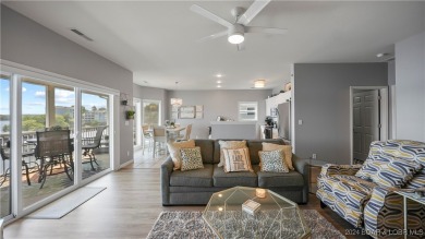 If you've been searching for a gorgeous turn-key condo with a on Seasons Ridge At Four Seasons in Missouri - for sale on GolfHomes.com, golf home, golf lot