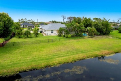 PRIVACY ABOUNDS with this immaculate custom Schroeder-built home on Pinemoor West Golf Club in Florida - for sale on GolfHomes.com, golf home, golf lot