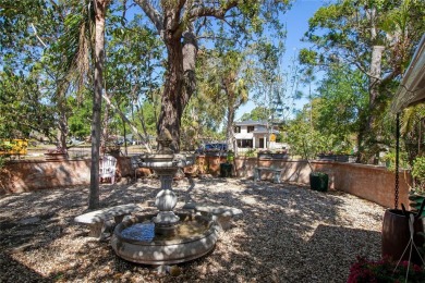 Under contract-accepting backup offers. This home in Lakewood on St. Petersburg Country Club in Florida - for sale on GolfHomes.com, golf home, golf lot