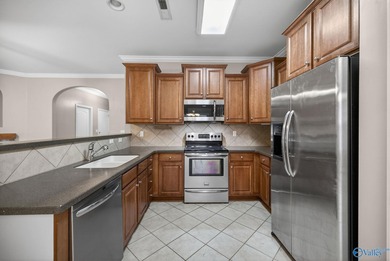 Stylish home located in the desirable Canebrake Subdivision on Canebrake Golf Club in Alabama - for sale on GolfHomes.com, golf home, golf lot