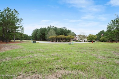 This 0.48-acre lot sits at the end of a cul-de-sac in The on River Landing Golf Course in North Carolina - for sale on GolfHomes.com, golf home, golf lot