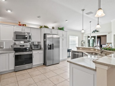 This custom Zinnia model home has so many upgrades! A rare find on Bella Glade Country Club in Florida - for sale on GolfHomes.com, golf home, golf lot