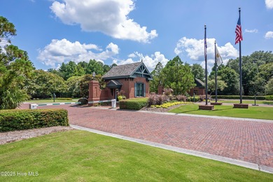 This 0.48-acre lot sits at the end of a cul-de-sac in The on River Landing Golf Course in North Carolina - for sale on GolfHomes.com, golf home, golf lot